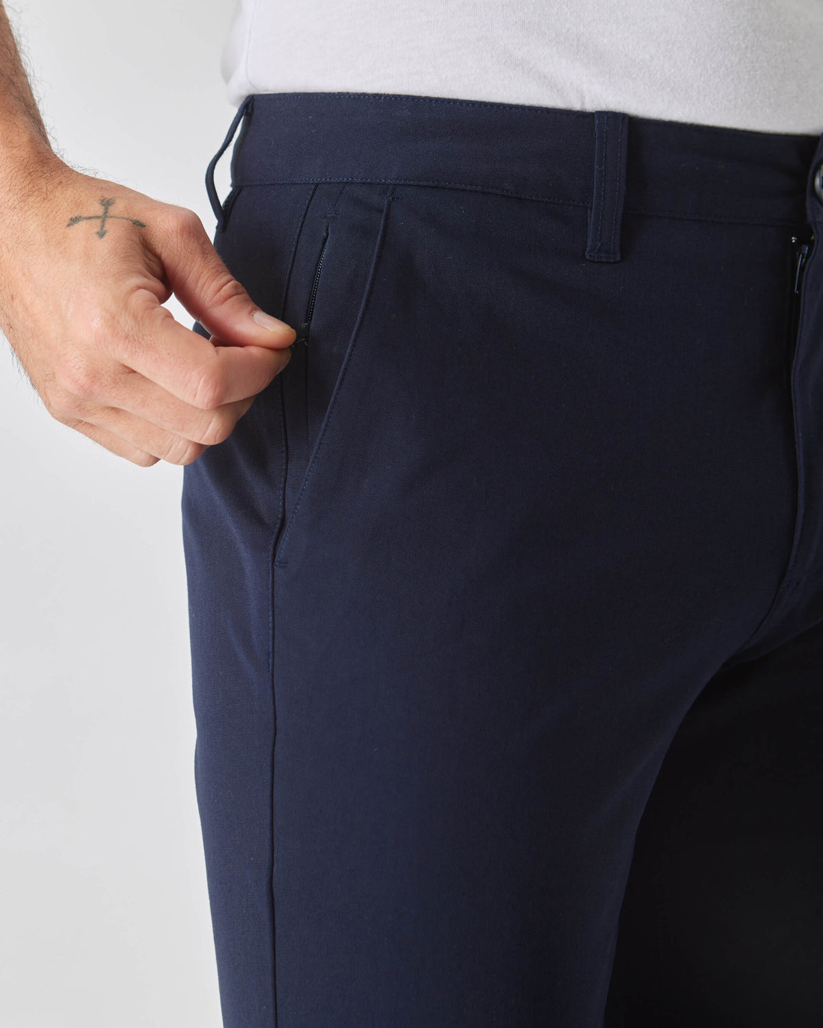 Navy Slim Twill Chino Pant with zippered side pocket detail.