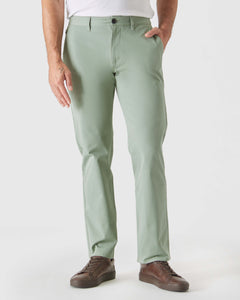 True ClassicMeadow Straight Twill Chino Pant with brown sneakers.