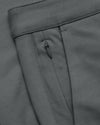 Carbon Straight Chino Pants 2.0, showcasing zippered pocket and textured fabric.