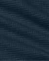 Close-up of Womens Navy Waffle Long Sleeve Henley & Waffle Leg Pant knit fabric.