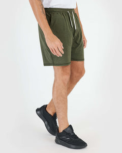 True ClassicPerson wearing Dark Heather Military Green Active Comfort Short and black running shoes.