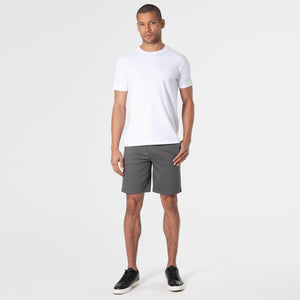 True ClassicMan wearing Carbon Comfort Chino Short, white T-shirt, black sneakers.