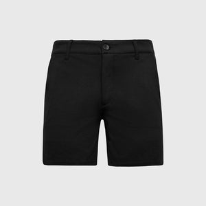 True Classic7 Black Comfort Knit Chino Shorts on light gray background.