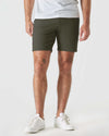 7 Military Green Comfort Knit Chino Short with tattoos on calves.