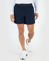 7 Navy Active Training Short on person walking, showcasing athletic fit.