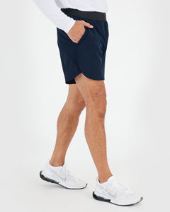 True Classic7 Navy Active Training Shorts 2.0 with scalloped legs, zippered pockets.