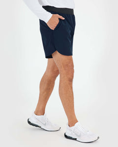 True Classic7 Navy Active Training Short with scallop hem and zippered pockets.