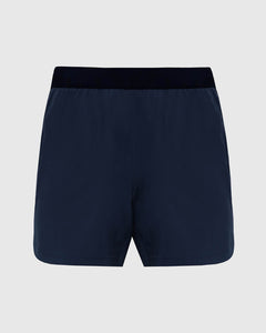 True Classic7 Navy Active Training Short with dark waistband and front hem split.