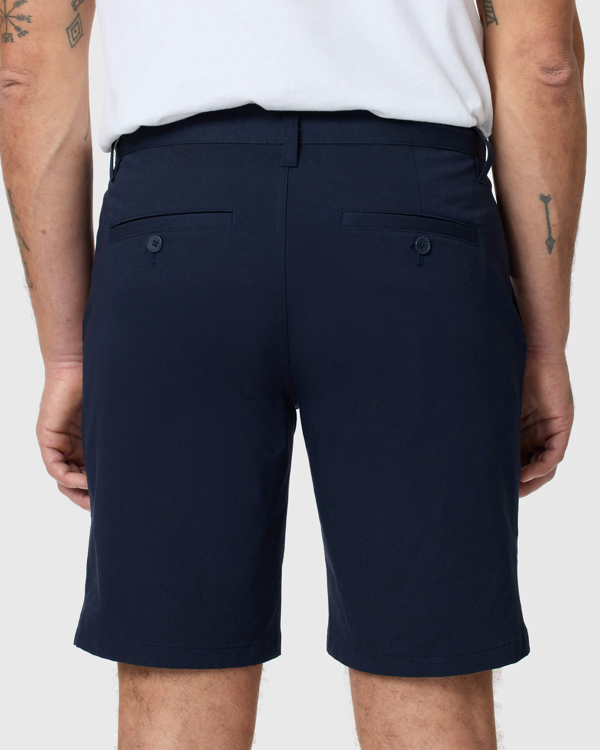 Back view of man in Navy Twill Short, white t-shirt.