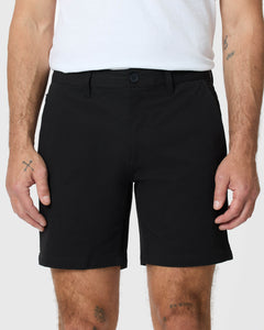 True Classic7 Black Classic Twill Shorts with button front, side pockets, and tattoos visible.