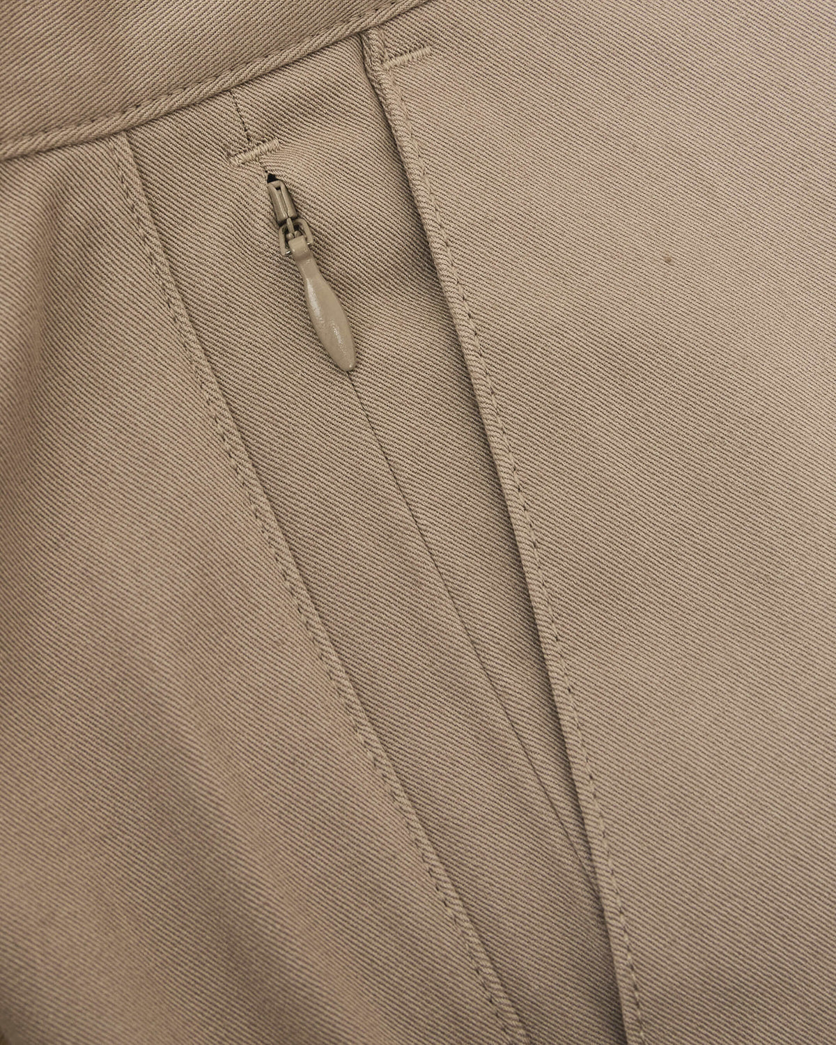 7 Khaki Classic Twill Shorts with visible seam stitching and zipper detail.
