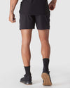 Black 2 In 1 Training Short with gum outsole Adidas sneakers.