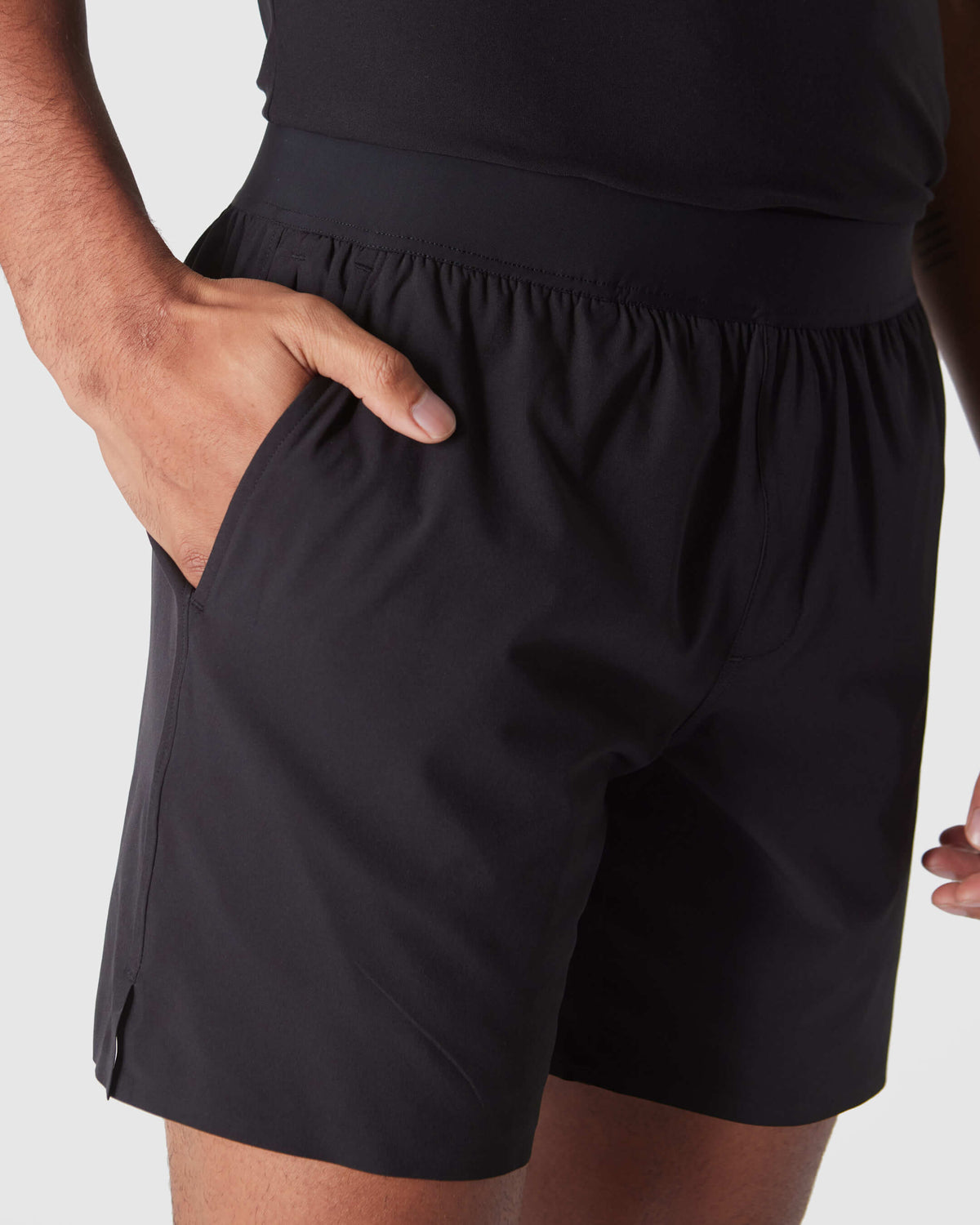 Black 2 In 1 Training Short with elastic waistband and side pockets.