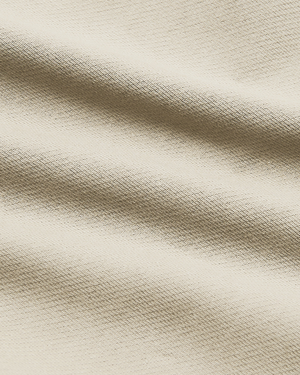 9 Sandstone Chino Shorts 2.0, light-beige woven texture, gentle fabric folds.