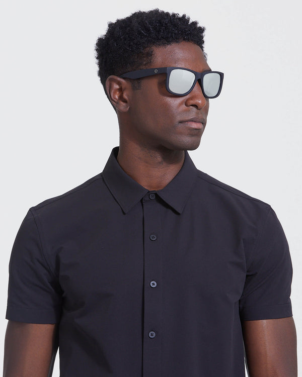 Man wearing Black Mirror Classic Polarized Sunglasses with mirrored lenses.