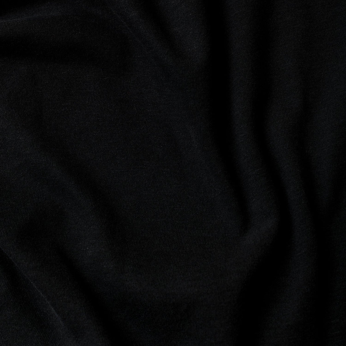 Black Classic Polo 3-Pack close-up showing weave and gentle fabric folds.