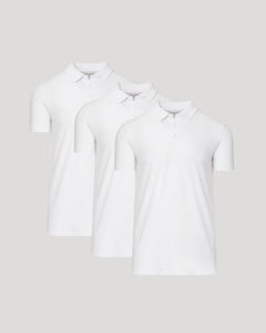 True ClassicAll White Tall Classic Polo 3-Pack: Three neatly arranged white polo shirts.