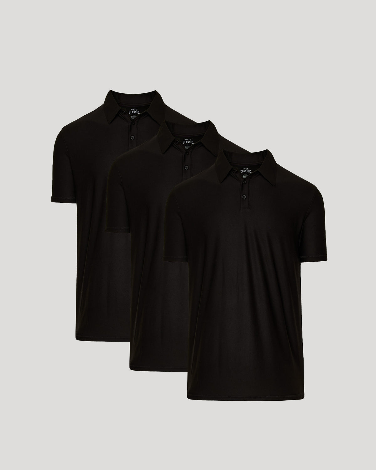True Classic Men’s Active Short Sleeve Polo, moisture-wicking, stretch fit shirts displayed.