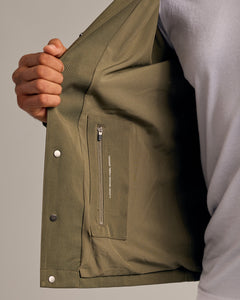 True ClassicMilitary Green Coaches Jacket with interior zip pocket and snap-button closures.