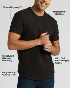 True ClassicMan wearing a black Heavyweight Curved Hem Henley 3-Pack shirt with tortoiseshell buttons, featuring a bicep-hugging fit, lengthening curved hem, structured shape retention, and ultra-soft heavyweight fabric.