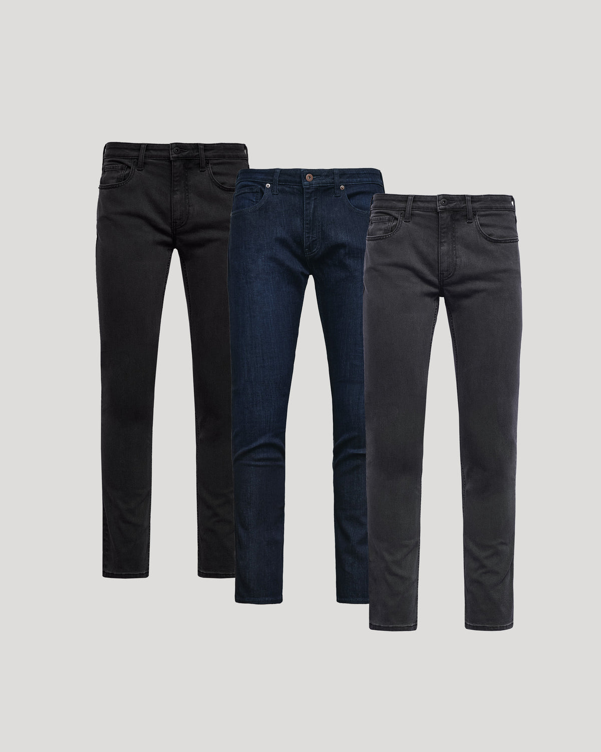 Three pairs of men's Slim Comfort Stretch Jeans 3-Pack in black, dark blue, and charcoal gray, displayed against a neutral background.
