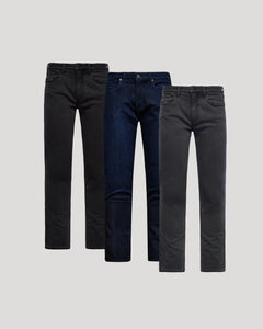 True ClassicThree pairs of jeans in black, blue, and gray on a light gray background
