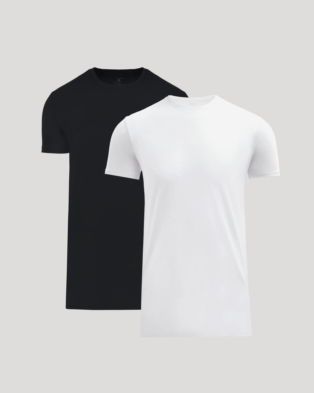 Two men's basic crew neck t-shirts in black and white, displayed side by side, showcasing the Tall Pima Cotton Blend Crew 2-Pack.