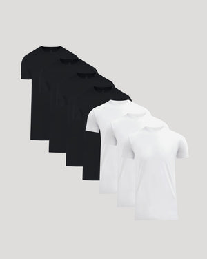 Seven men's basic crew neck t-shirts in black and white, arranged in a staggered row showcasing the Tall Pima Cotton Blend Crew 7-Pack.
