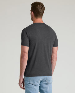 True ClassicMan wearing Charcoal Heather Gray Classic Crew Neck and light-wash jeans.