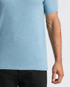 Heather Indigo Classic Crew Neck on person, tucked into black pants.