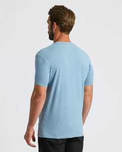 True ClassicMan wearing Heather Indigo Classic Crew Neck T-shirt, back view.