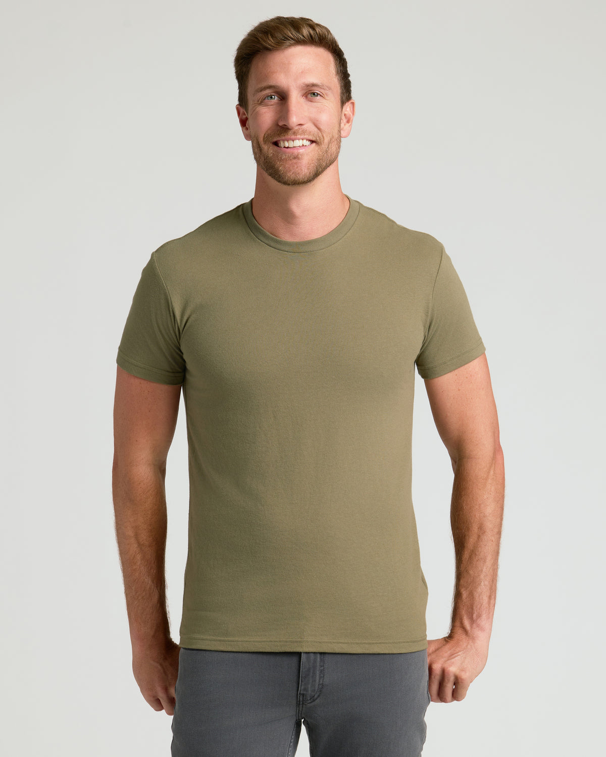 Man in olive T-shirt from The Staple Classic Crew 10-Pack.