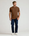 Man wearing Sepiawood Classic Crew Neck T-shirt and jeans.