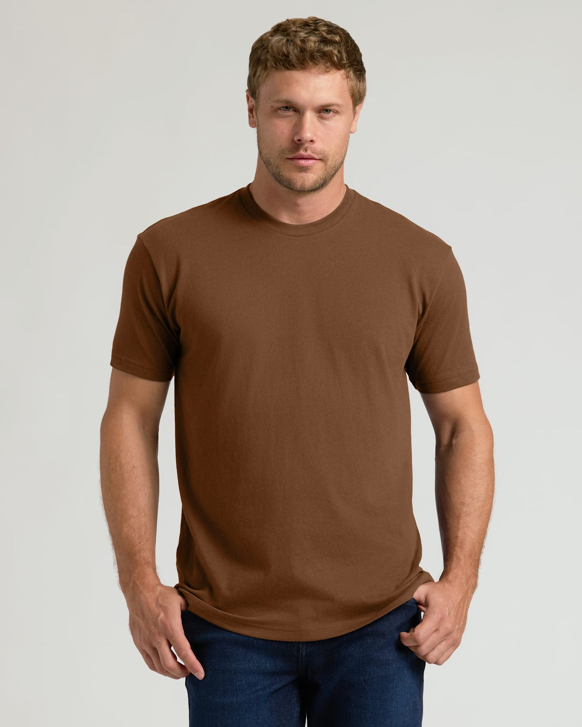 Man wearing Sepiawood Classic Crew Neck T-shirt and jeans.