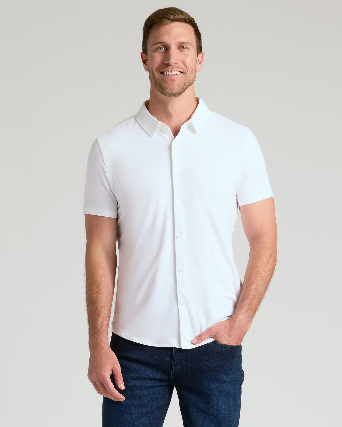 Man wearing Neutral Short Sleeve Comfort Knit Shirt, showcasing its casual, comfortable fit.