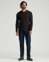 Man wearing All Black Dressy V-Neck Sweater 2-Pack, showcasing its fit.