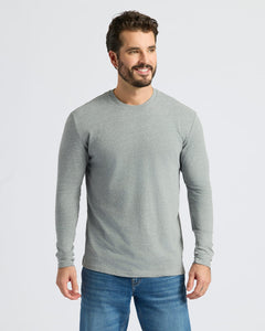 True ClassicMan wearing Heather Gray Classic Long Sleeve Crew Neck and medium-wash jeans.