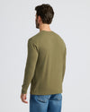 Man wearing Military Green Classic Long Sleeve Crew Neck with jeans.