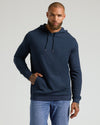 Man wearing Variety Hoodies 3-Pack navy pullover with jeans.