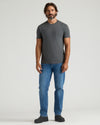 Man in Staple Heavyweight Pocket Crew T-shirt, showcasing casual fit.