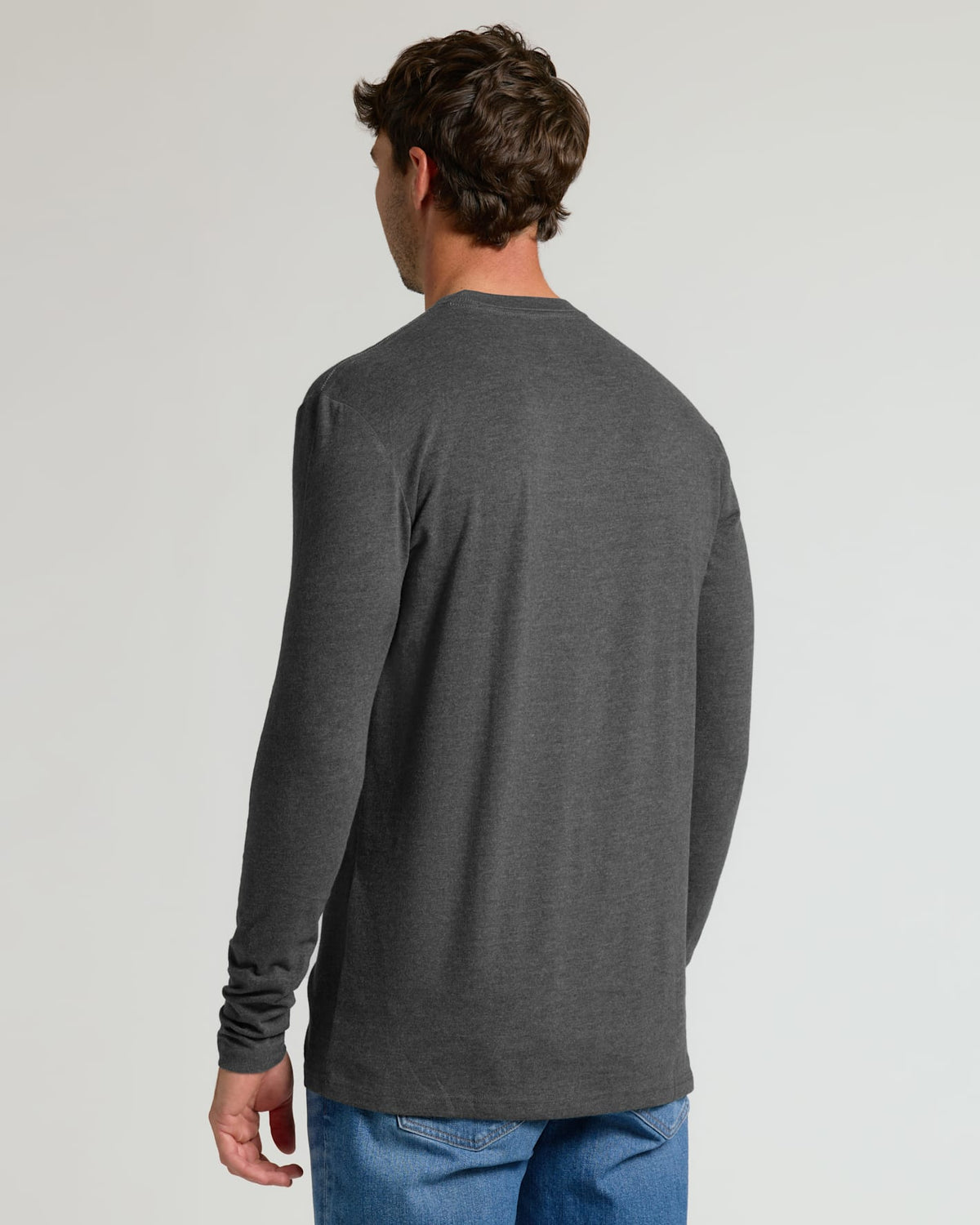 Back view of a man wearing the Charcoal Heather Gray Tall Long Sleeve T-Shirt in a relaxed fit. A versatile men's basics layer for everyday wear.