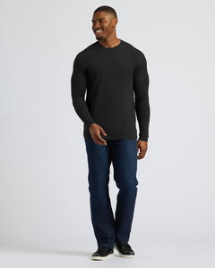 True ClassicMan wearing Black Tall Long Sleeve T-Shirt, dark jeans, black sneakers.