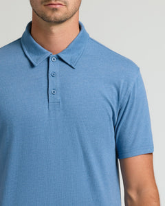 True ClassicDark Heather Blue Lake Short Sleeve Tall Polo with three-button placket and collar.