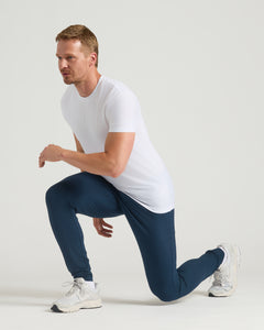 True ClassicMan in Dark Heather Navy Tall Active Joggers, ready to sprint.