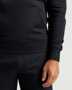 True ClassicBlack Pullover Fleece Hoodie & Jogger 2-Pack showing men's basics with soft fleece texture a kangaroo pocket and ribbed cuffs in a close-up view