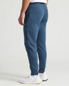 Fiord Fleece French Terry Joggers with pockets and white sneakers.