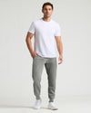 Medium Heather Gray Pullover Fleece Crew & Jogger 2-Pack worn by man.