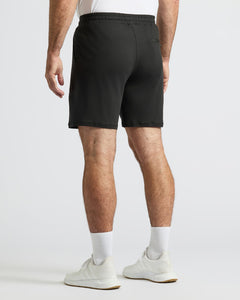 True ClassicWearing Black Active Comfort Shorts with white socks and sneakers.