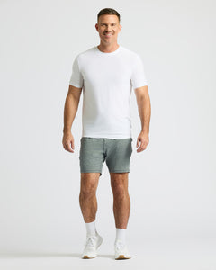 True ClassicMan wearing Heather Gray Active Comfort Shorts, white T-shirt, and sneakers.