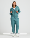 Model in Womens Stormcloud Relaxed Joggers and hoodie, showcasing relaxed fit.